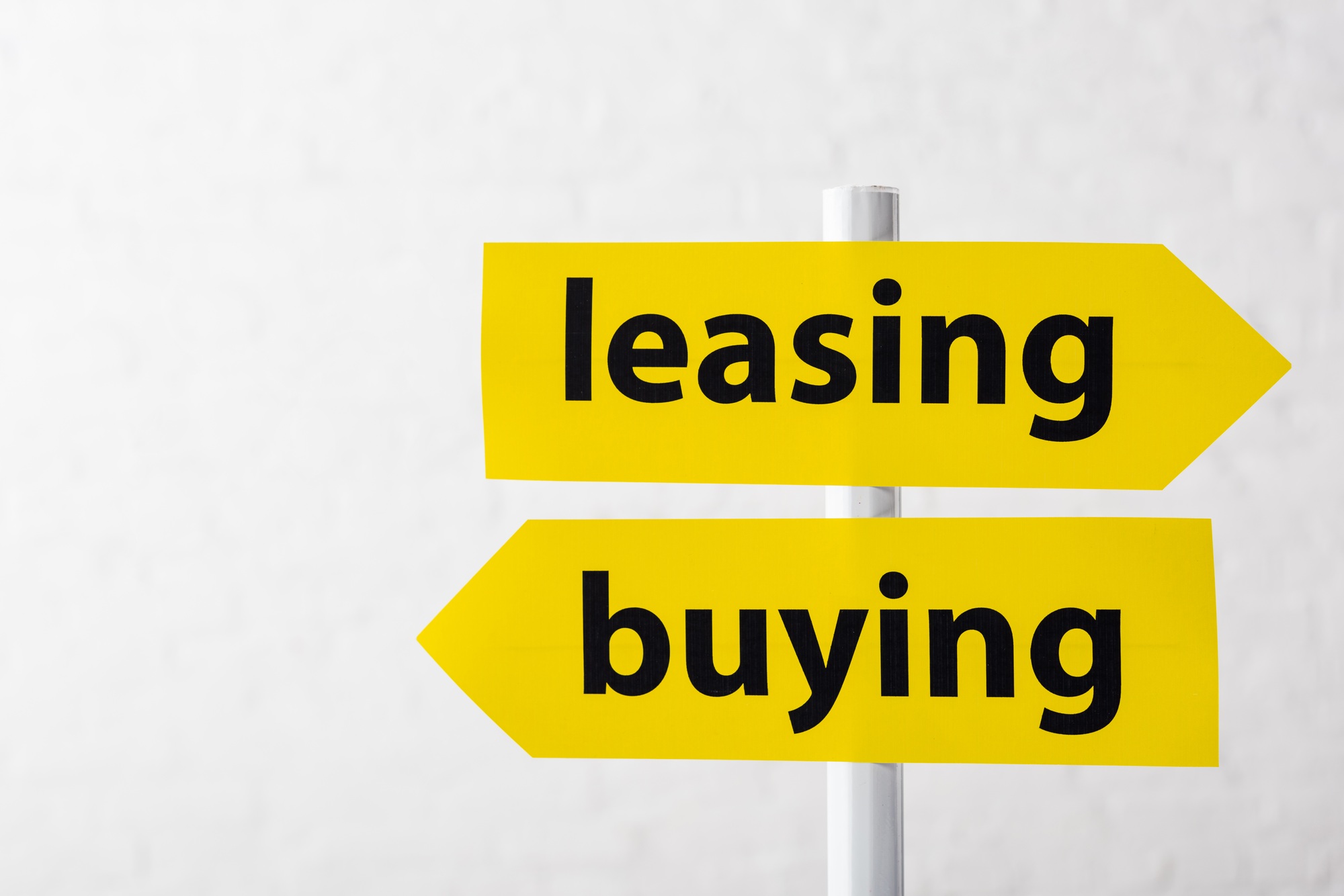 directional arrows with leasing and buying lettering isolated on white